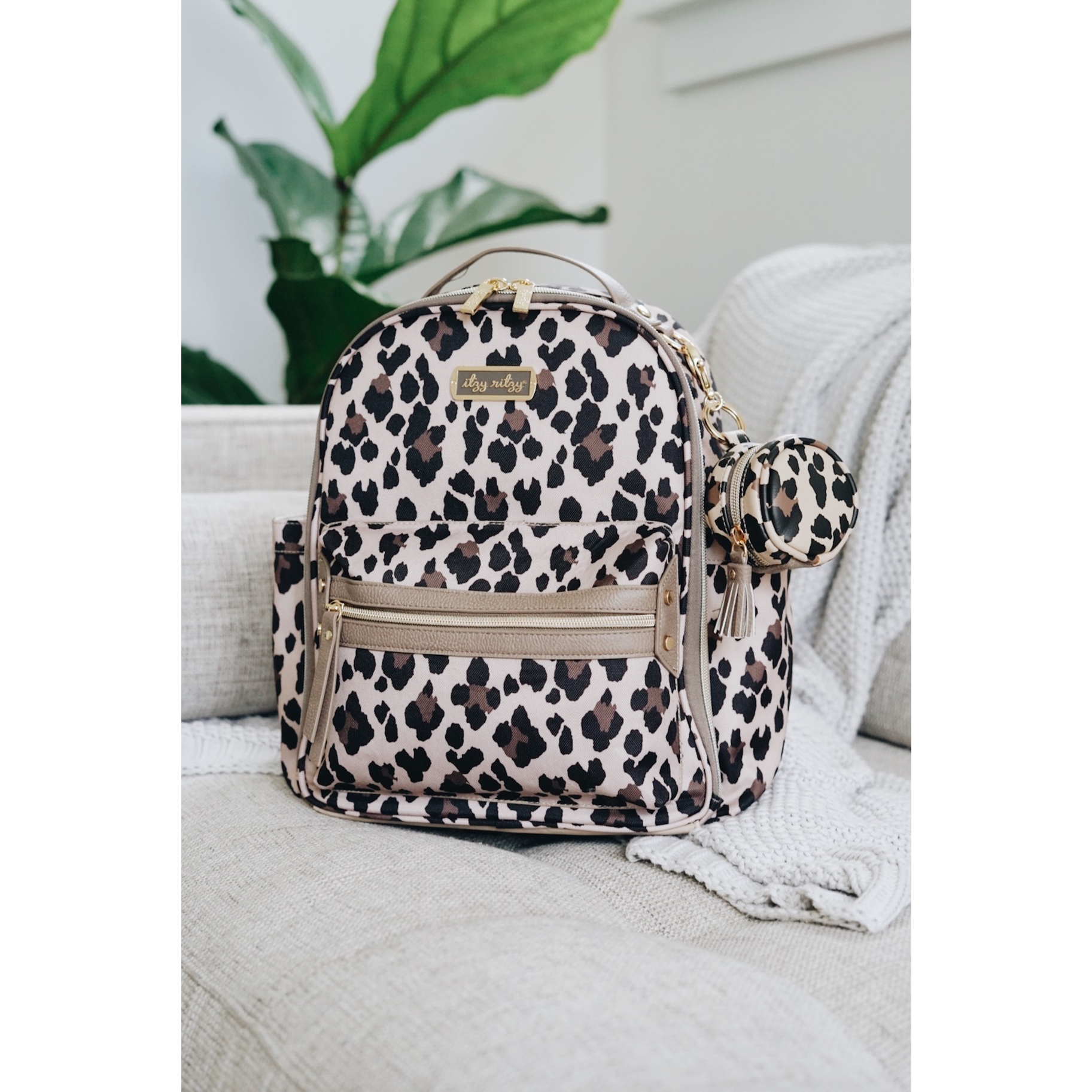 itzy ritzy mini diaper bolsa leopard